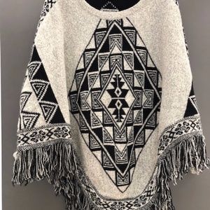 Aztec pattern black and gray poncho.